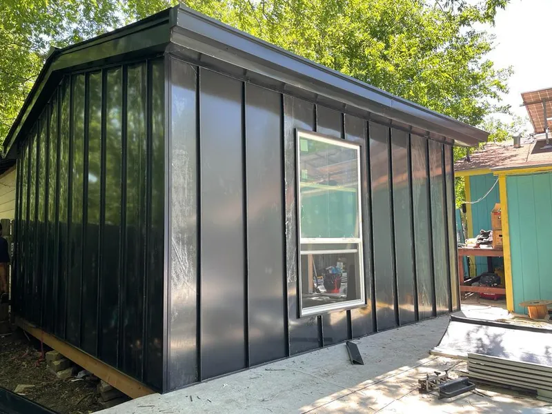 Black standing seam metal wall panels for Metal Roof Installation in Charlestown